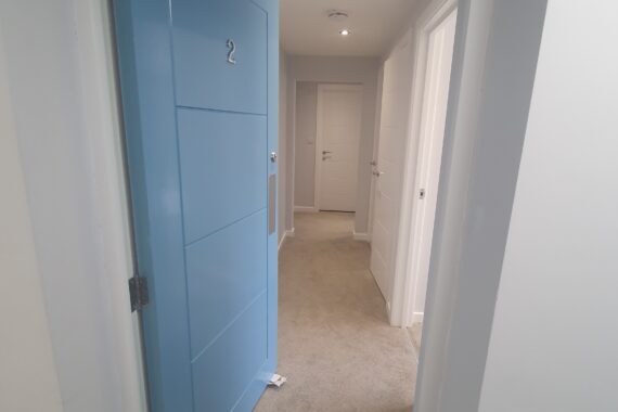 Top Drawer Construction bespoke carpentry blue front door fitting studio flat Woking Weybridge Surrey